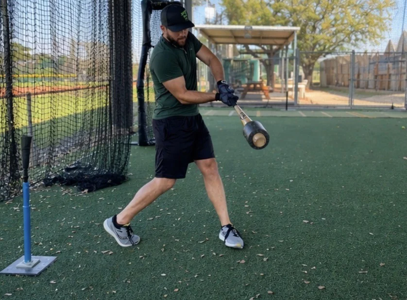 Baseball player training with Tee-Pea Roll inspired by Coach RAC